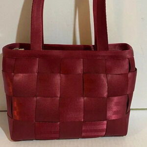Harvey’s red original seatbelt shoulder handbag
